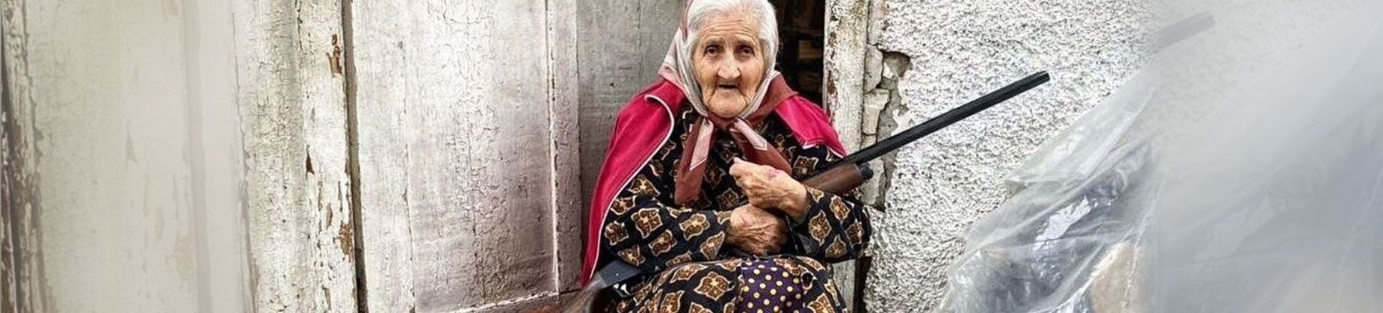 Armenian Grandmother Sharnakh defending Homeland with rifle. Artsakh (Nagorno Karabakh)