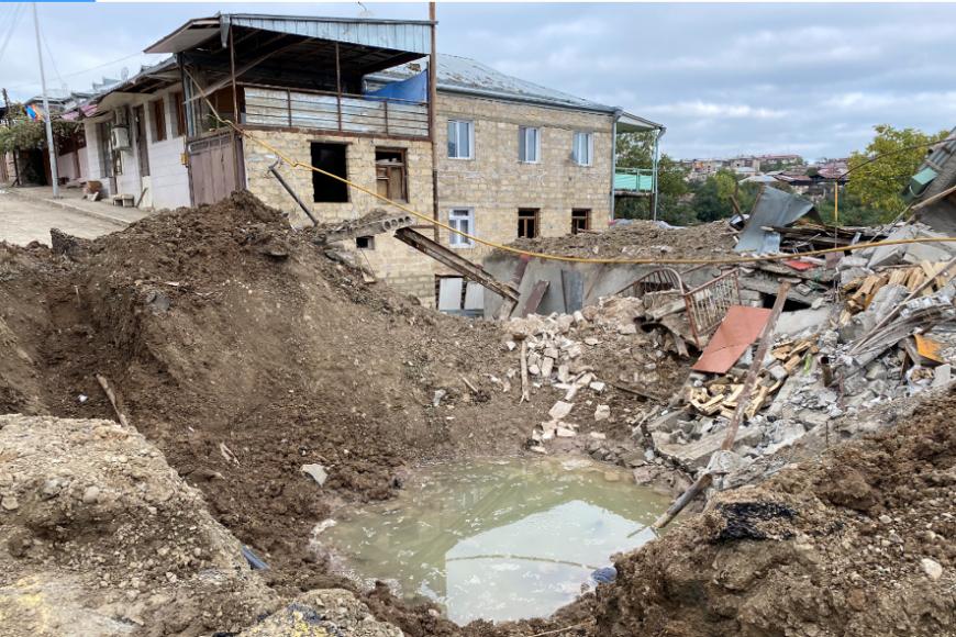 Impact crater in a residential neighborhood in Stepanakert, Nagorno-Karabakh on Sasountsi David Street from an attack by Azerbaijan aircraft on October 4, 2020. © 2020 Human Rights Watch